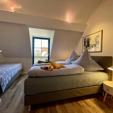 Апартаменты Hus Strandgut