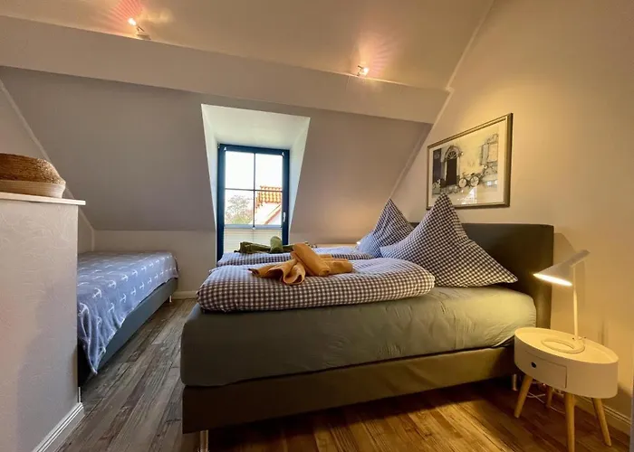 Апартаменты Hus Strandgut